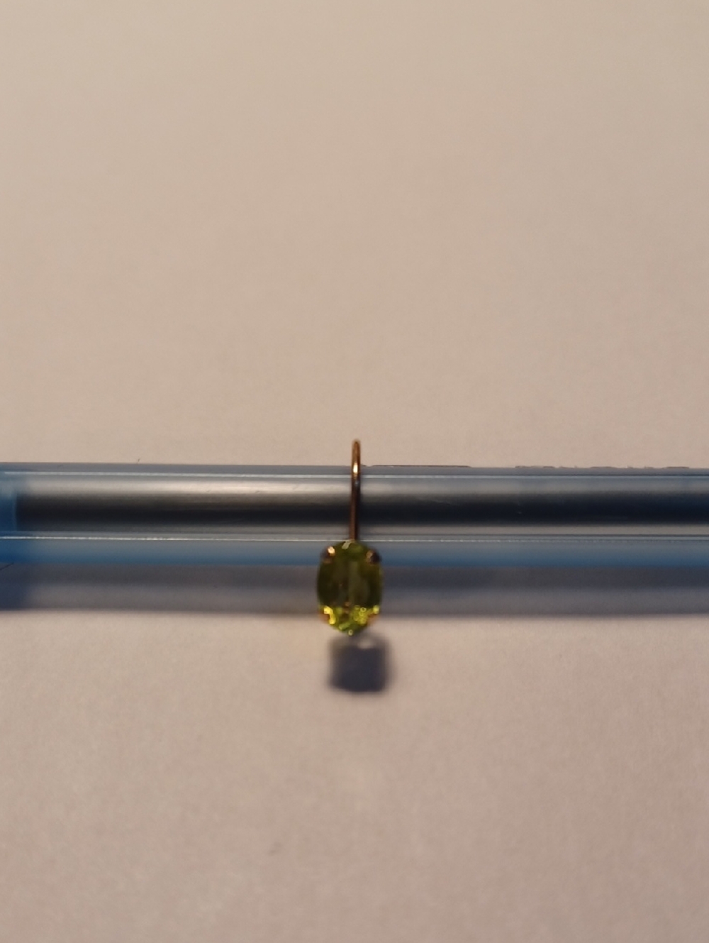 Single 10k Peridot Stone Earring.